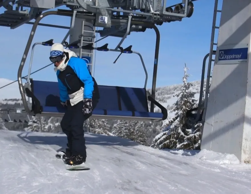 Comment monter sur un téléski avec un snowboard