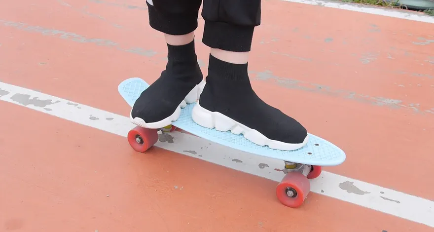 Comment monter sur un Penny Board