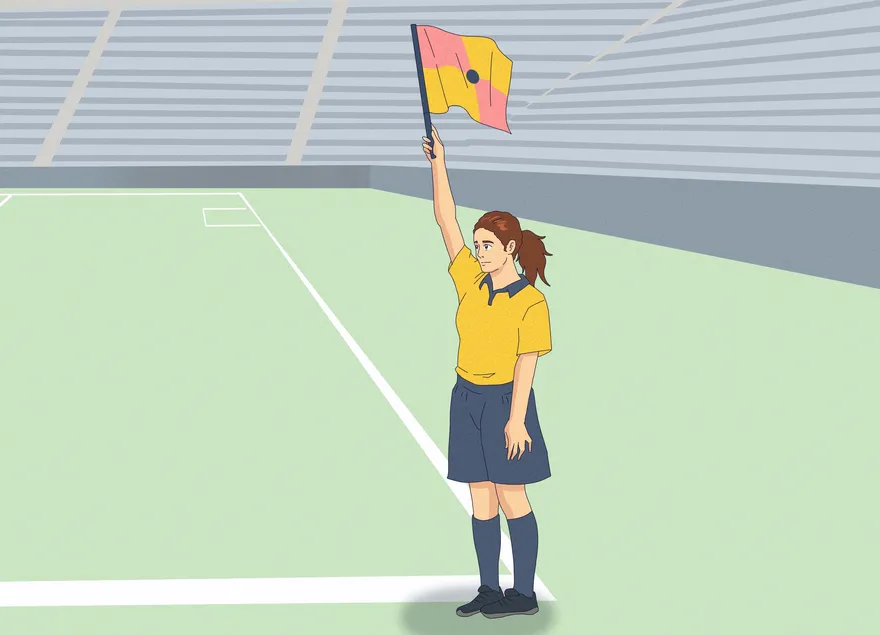 Comment comprendre les signaux de l'arbitre assistant de football