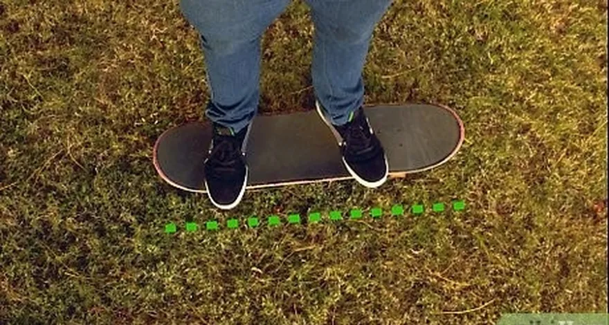 étape 3 tiens-toi debout sur ton skateboard sur de la moquette ou de l'herbe.