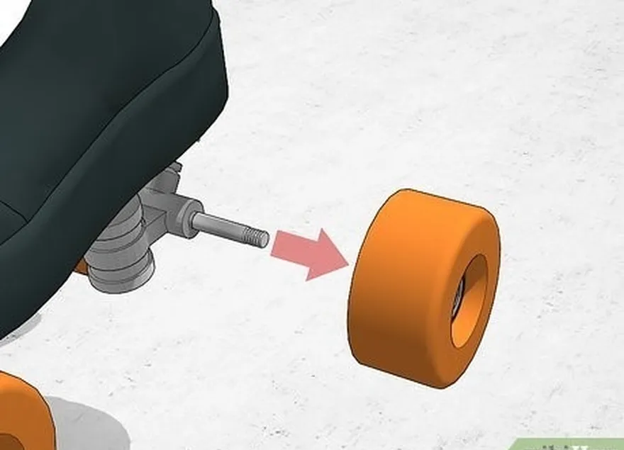 étape 2 faites glisser les roues hors des essieux et posez-les sur une surface de travail plane.