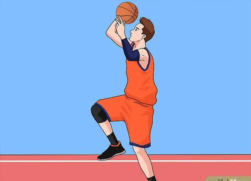 étape 5 : sautez du pied gauche comme si vous faisiez un layup normal du côté droit.