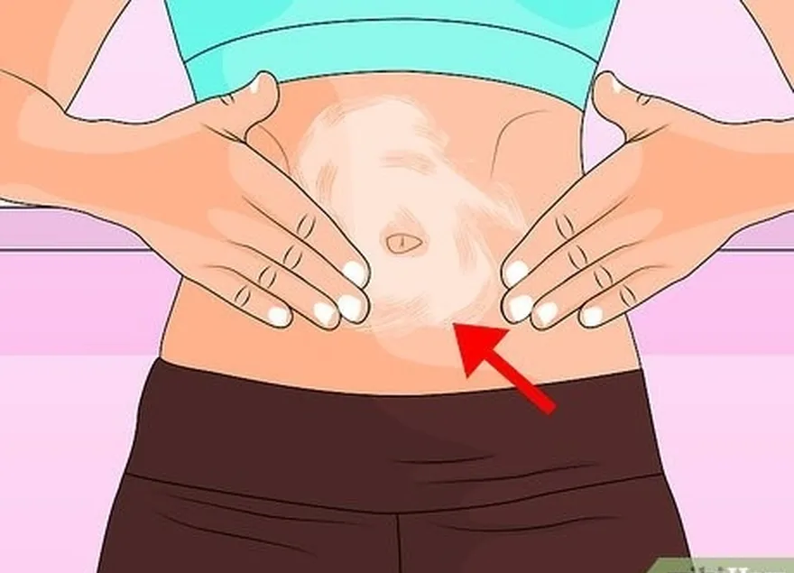 étape 1 appliquez votre fond de teint, votre crème hydratante teintée ou votre écran solaire sur votre abdomen.