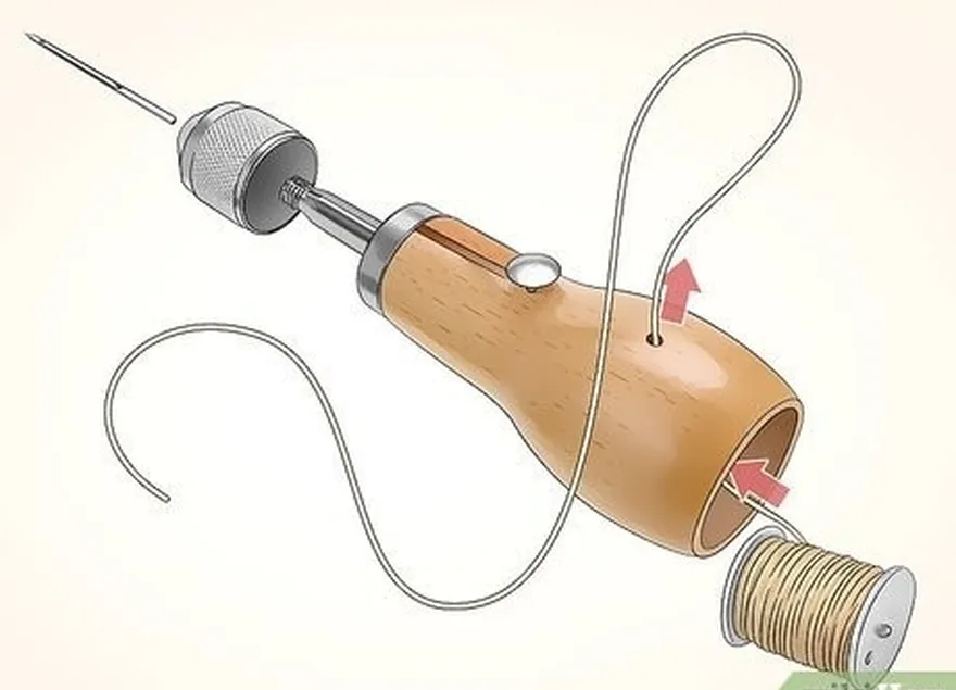 étape 2 enfilez de la ficelle épaisse dans une alène à coudre pour fixer les sangles en nylon.