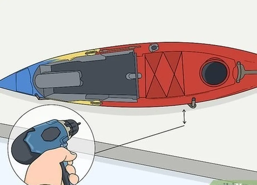 étape 7 faites une autre paire de trous pilotes à environ 2,5 cm des bras de suspension.