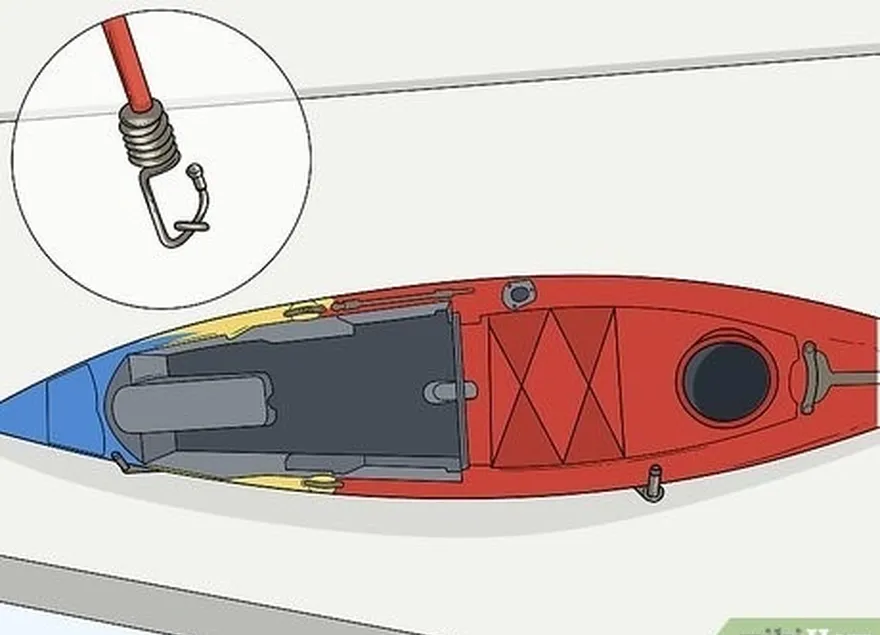 étape 9 fixez le kayak au support à l'aide d'une paire d'élastiques.