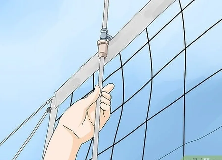 étape 8 attachez les antennes de volley-ball au filet pour repérer plus facilement les fautes.