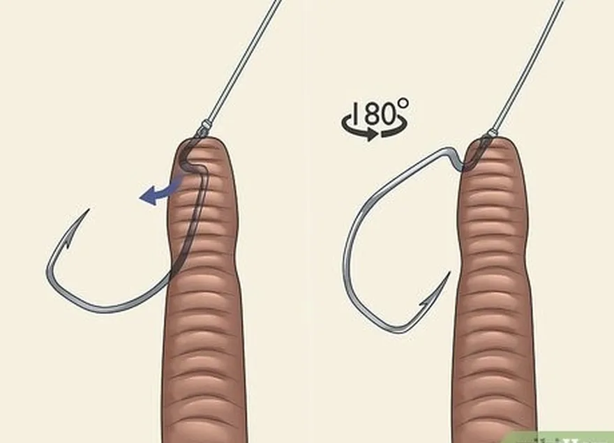 étape 3 faites glisser le ver en plastique le long de l'hameçon jusqu'à ce que sa tête touche l'œillet de l'hameçon.
