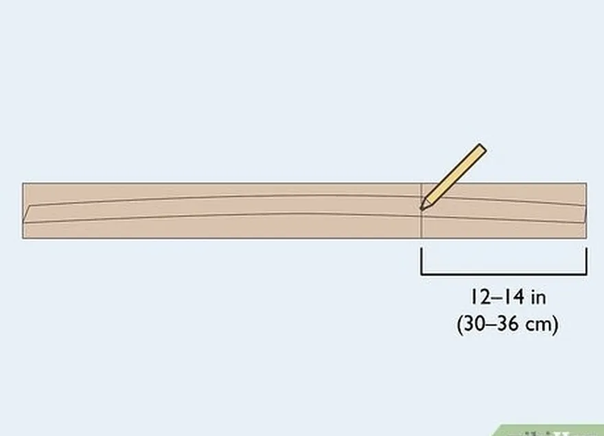 étape 4 tracez la ligne où vous voulez que le manche commence à l'autre extrémité.