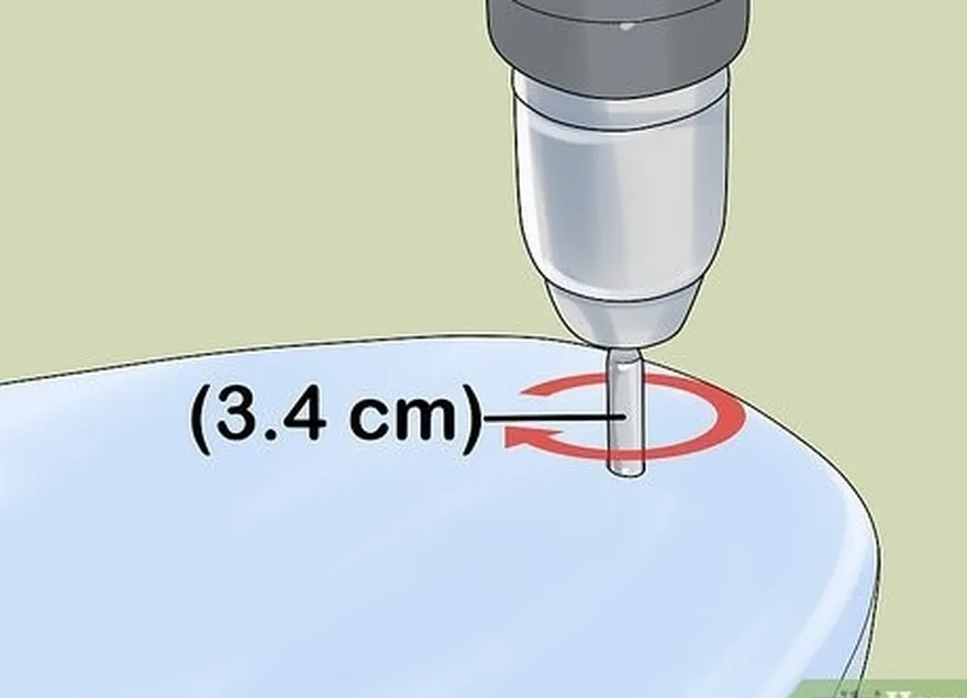 étape 1 percez un trou pour le connecteur de laisse à l'aide d'une mèche de 3,4 cm de diamètre.