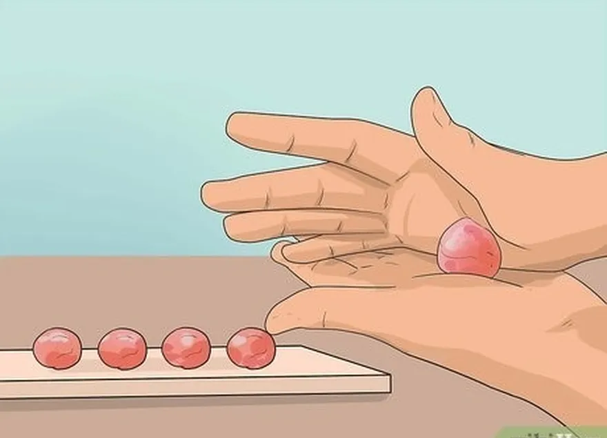 étape 5 roulez la pâte en boules de 2,5 cm de diamètre.