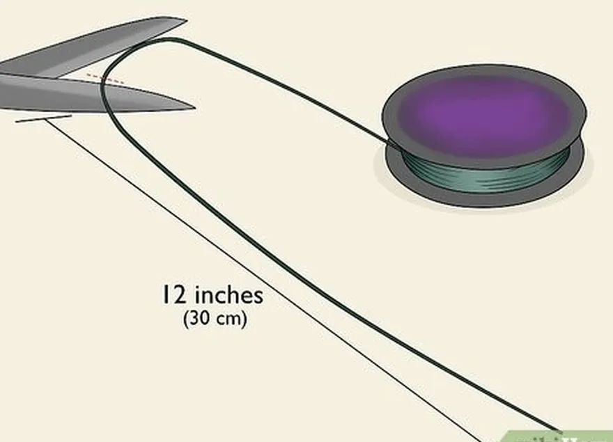 étape 2 coupez une longueur de fil de pêche d'environ 30 cm.