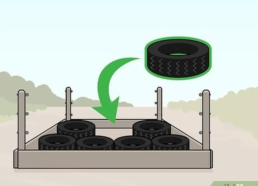 étape 1 tapissez le fond du cadre de votre ring de lutte avec des pneus ou des matelas.