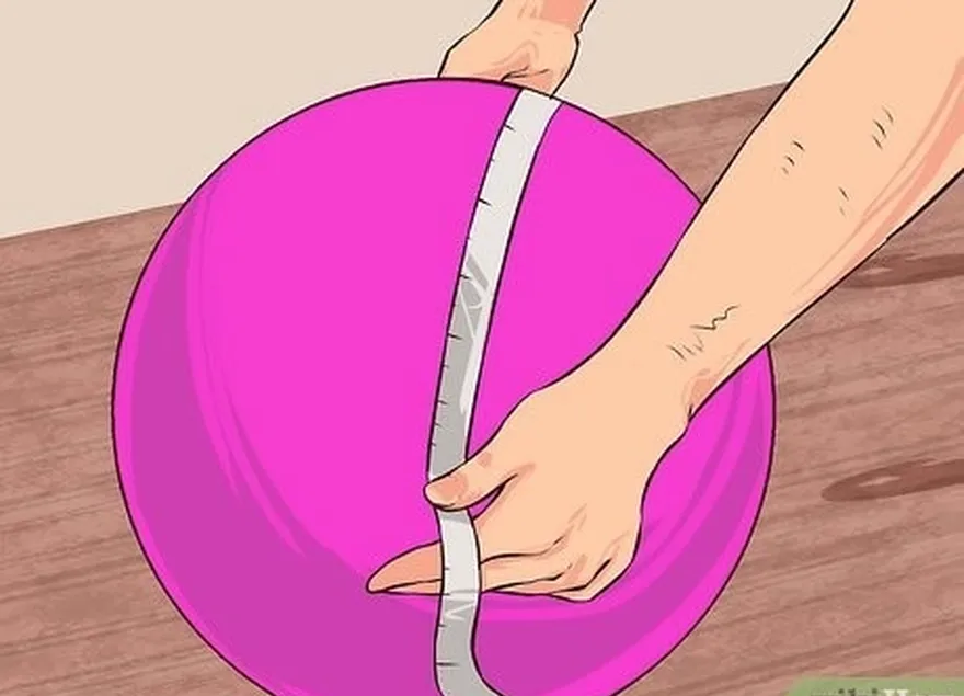 étape 1 enrouler un ruban à mesurer flexible tout autour du ballon de fitness gonflé.