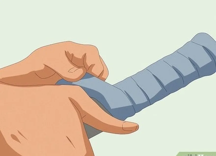 étape 2 : ajoutez un overgrip pour augmenter légèrement la taille de votre raquette.'s grip size.