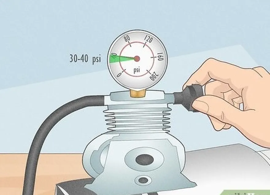 étape 3 réglez la pression d'air du compresseur entre 30 et 40 psi et raccordez-le à votre aérographe.