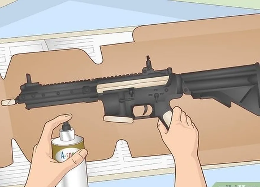 étape 9 reposez votre pistolet sur sa boîte en carton et préparez vos peintures et tout ce dont vous aurez besoin à proximité.