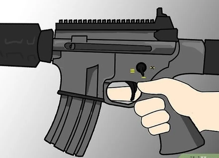 étape 7 saisissez la crosse (qui peut ressembler à une crosse de pistolet) ; placez votre index sur le côté de l'arme, au-dessus de la détente.