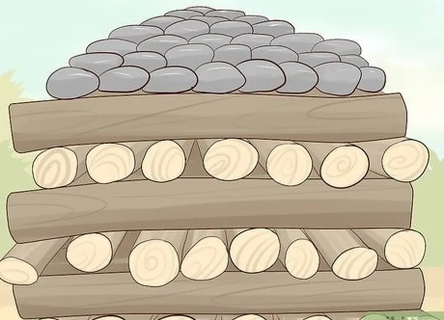étape 5 empilez le bois et les pierres volcaniques sur le sol pour faire une cheminée.