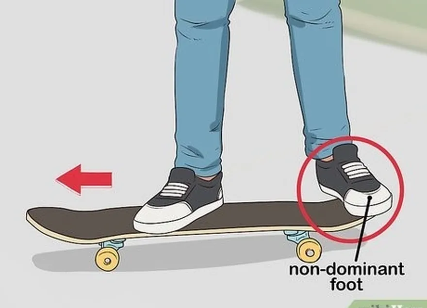 étape 2 déplacez votre pied non dominant vers l'arrière du skateboard.