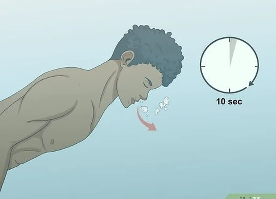 étape 2 plongez la tête sous l'eau et faites des bulles pendant 10 secondes.