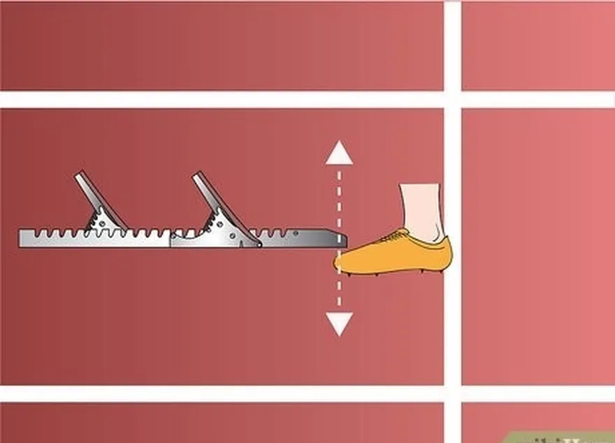 étape 4 positionnez fermement les blocs sur la piste au niveau de votre pointe (la pièce métallique plate à l'extrémité du corps principal).