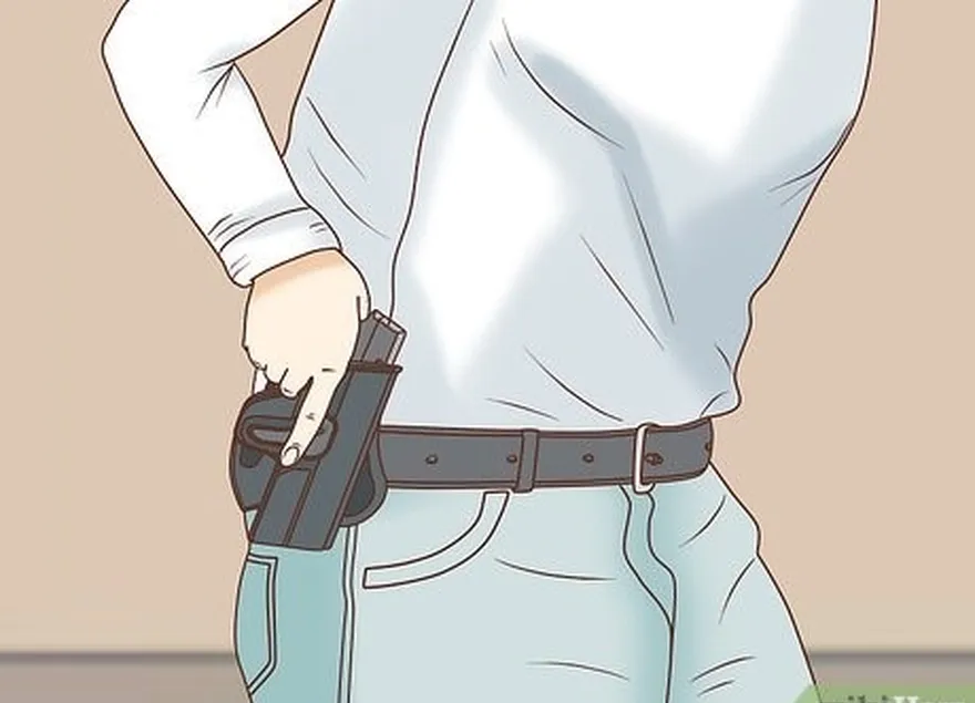 étape 5 placez le pistolet dans l'étui au-dessus de votre ceinture, côté palette vers l'intérieur.